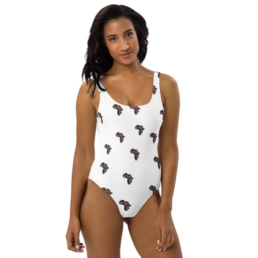 One piece white swimsuit with graphic print